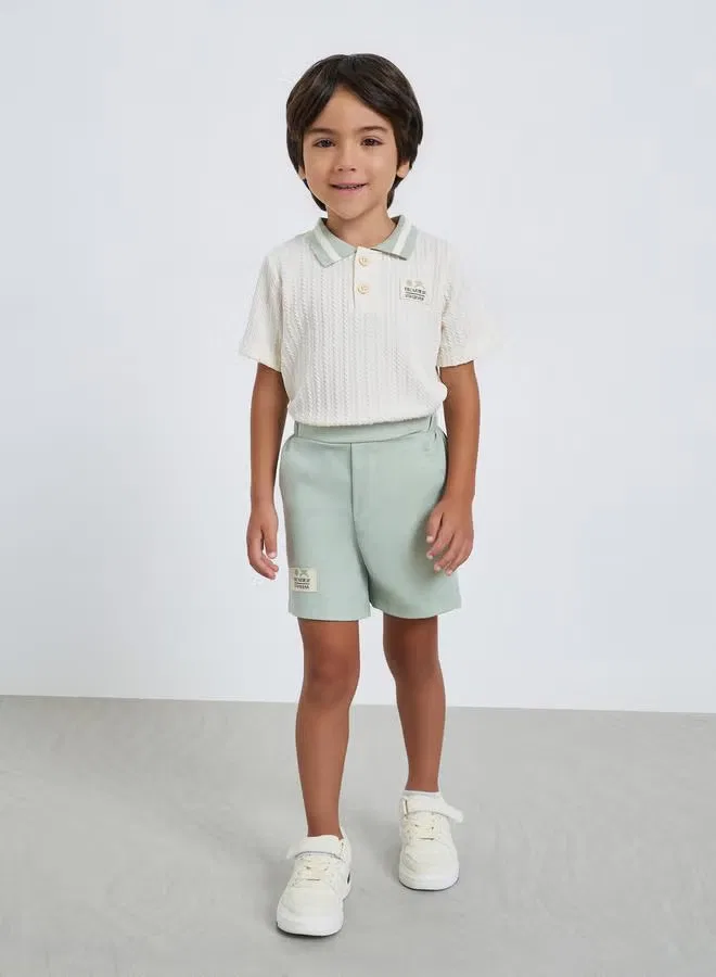 Комплект футболка поло и шорты Boys textured polo t-shirt and woven shorts set Styli, зеленый