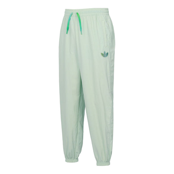 

Брюки woven Adidas, зеленый
