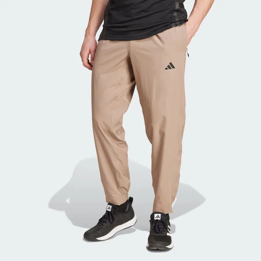 Спортивные брюки с зауженными штанинами и карманами на молнии adidas Performance Train Essentials, Серый