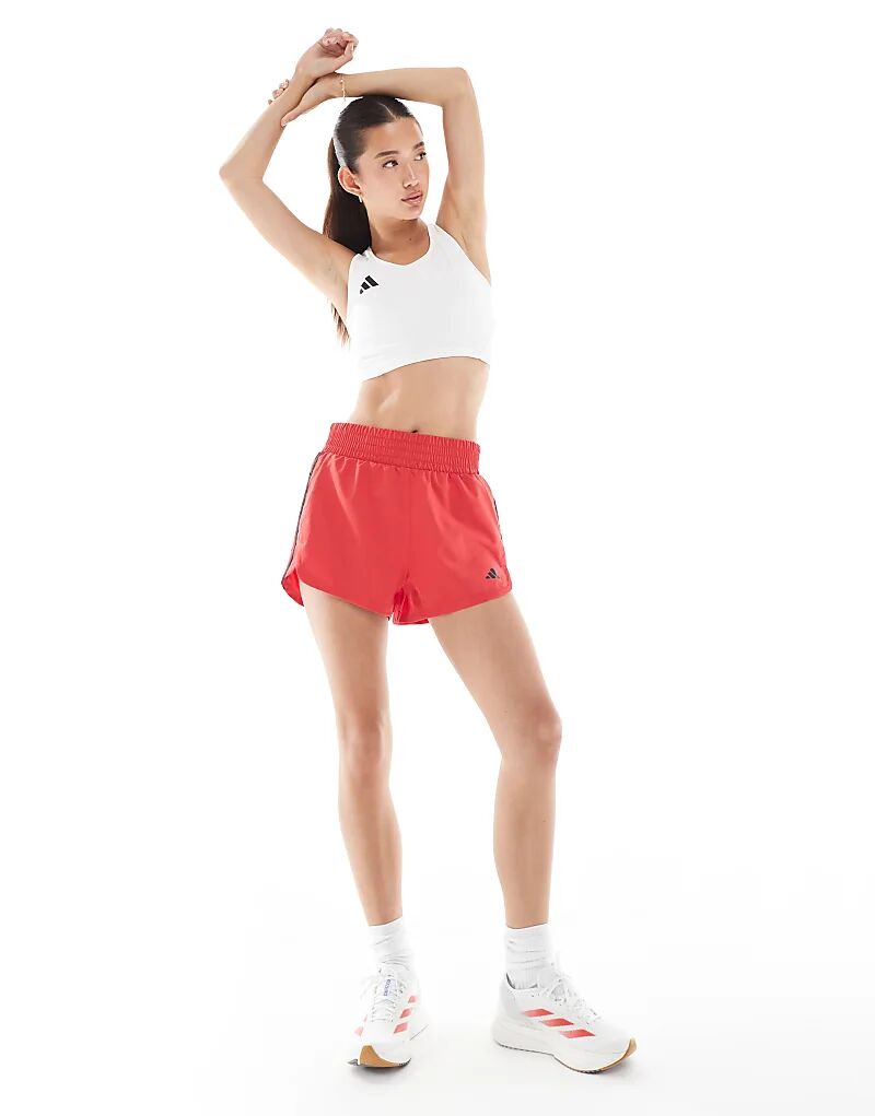 

Тренировочные шорты adidas Performance Pacer с тремя полосками, плетеные, с высокой посадкой, чистого рубинового/белого цвета