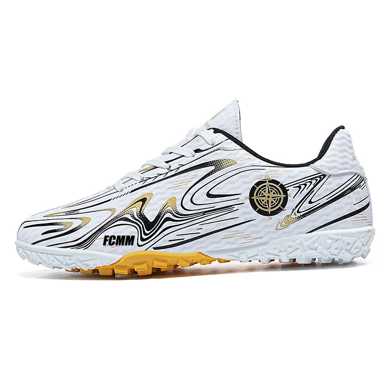 

Футбольные бутсы детские, нескользящие, износостойкие, легкие, с амортизацией и низким верхом FCMM, белый/золотой