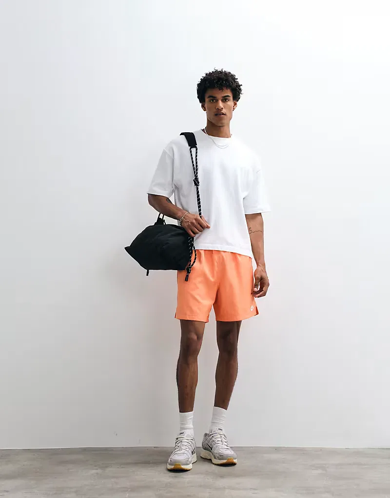 Шорты Nike Club Woven оранжевого