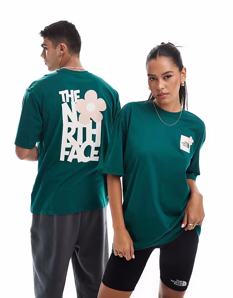 

Футболка оверсайз с принтом на спине The North Face Flower темно-зеленого цвета