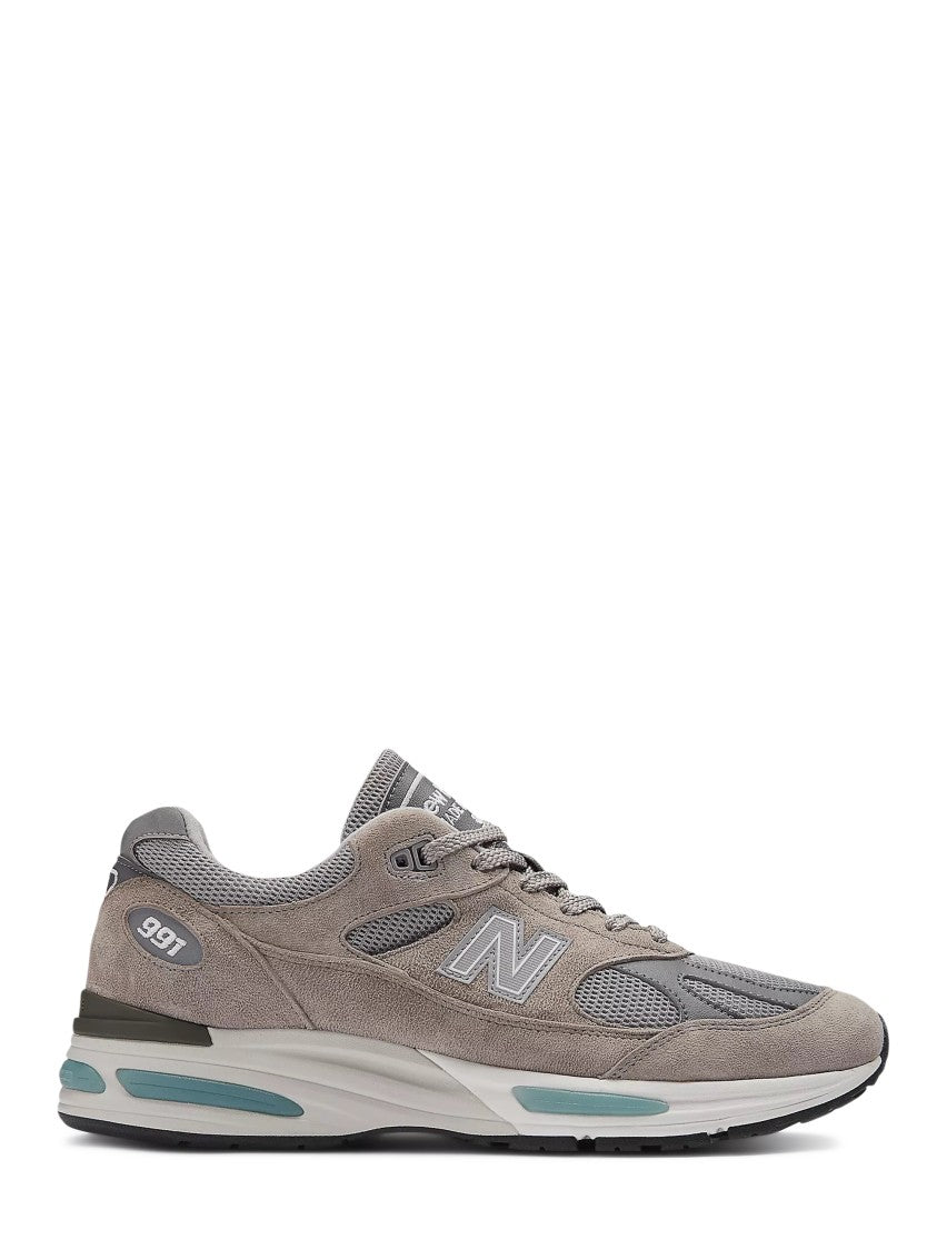 

Спортивные серые кроссовки с сеткой New Balance, серый