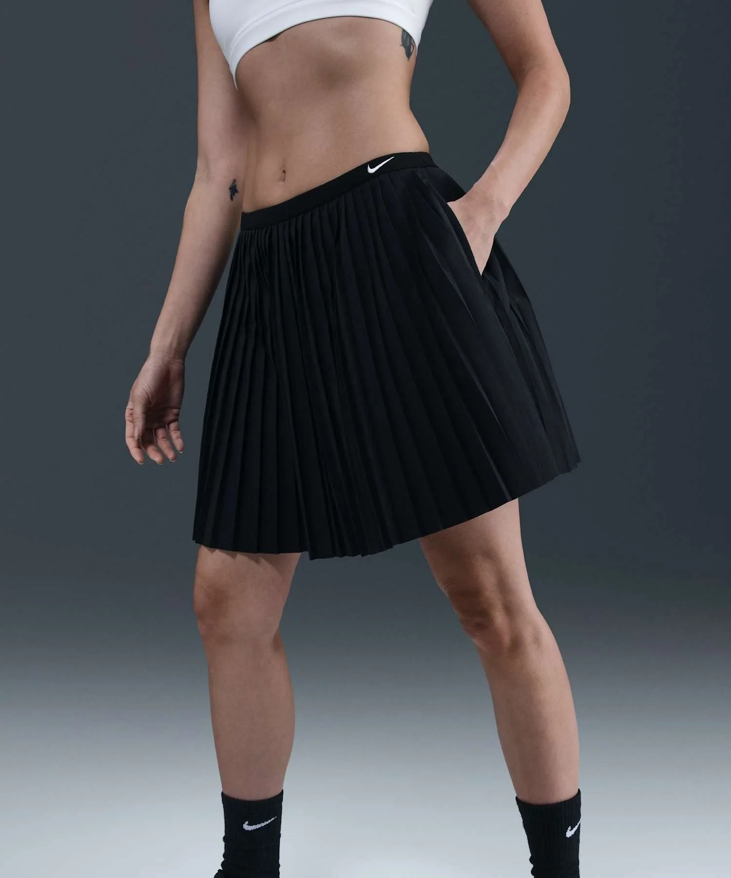 Женская юбка спортивная с плиссировкой Nike Sportswear Pleated Skirt IM7464-010 черная — фото 3