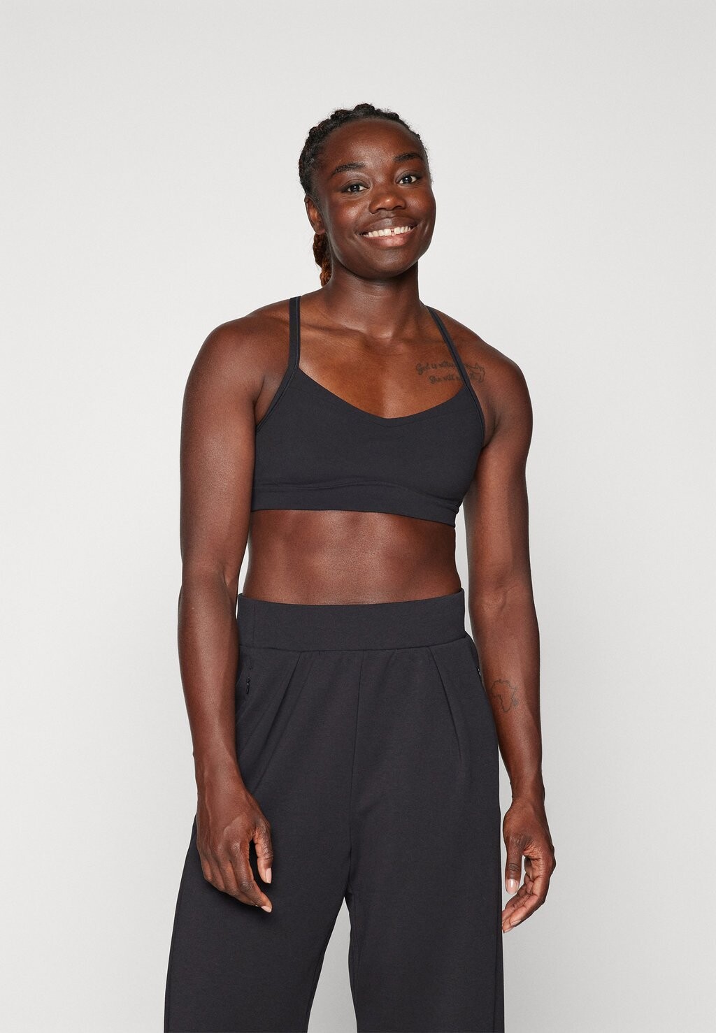 

Спортивный бюстгальтер со средней поддержкой VITAL BRA Athleta, цвет black