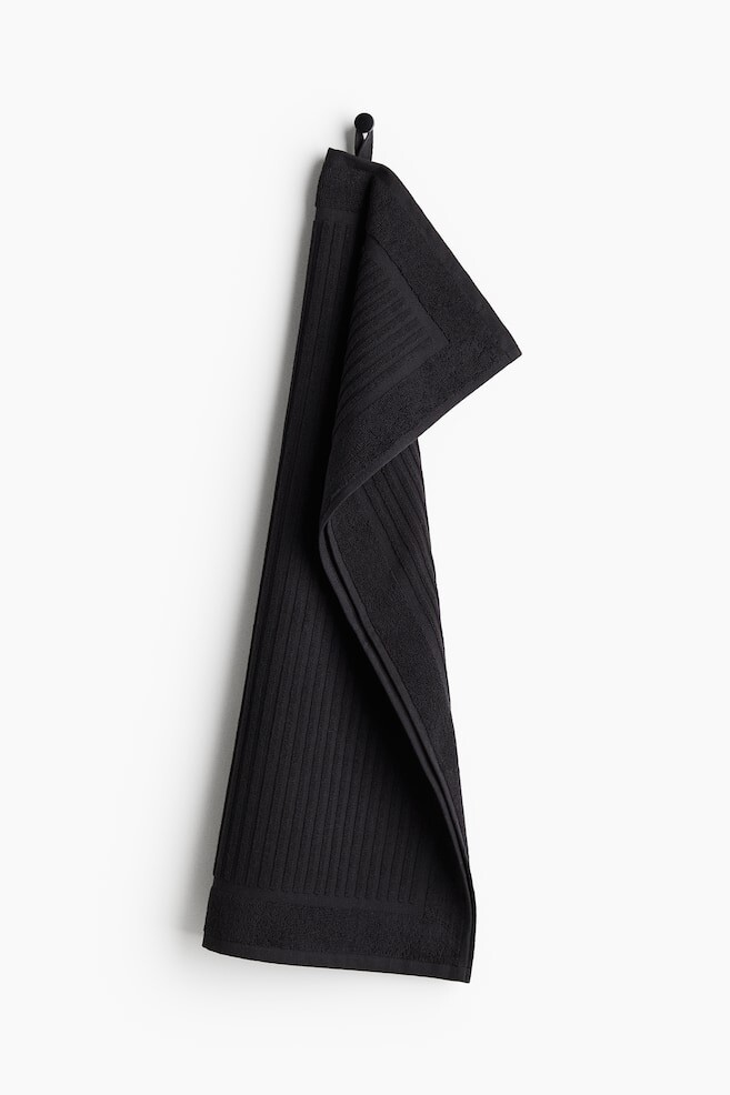 

Хлопковое махровое полотенце H&M, 50x70 см, черный