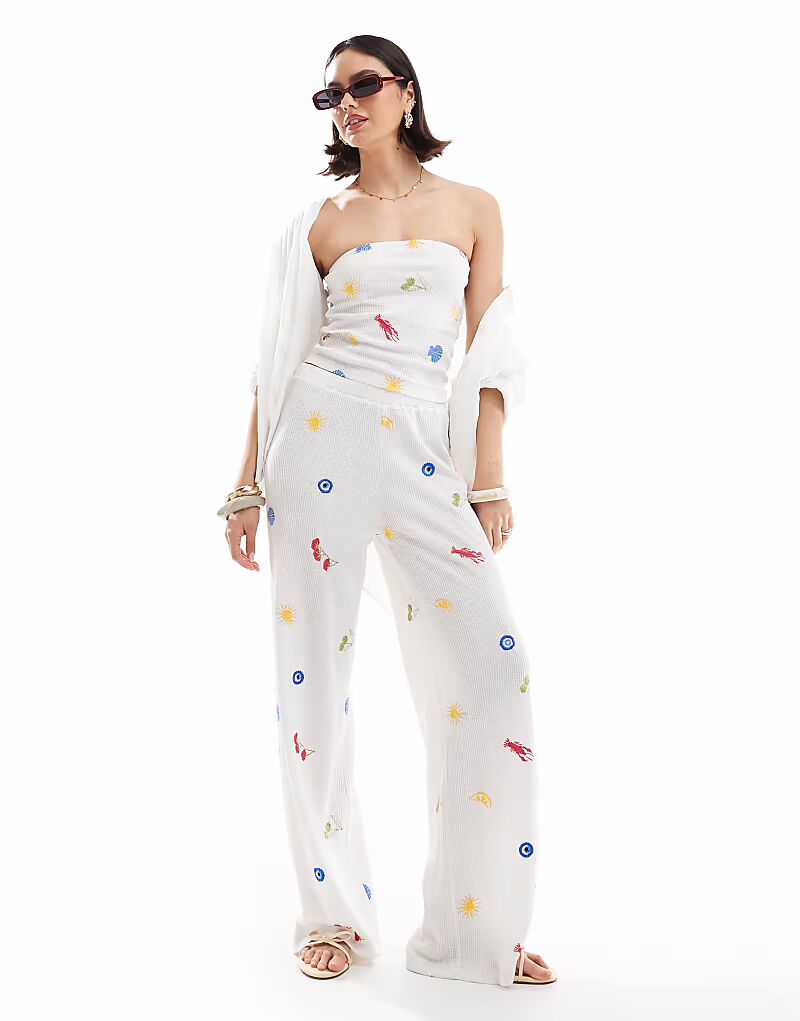 

Прямые брюки с праздничной вышивкой белого цвета Asos Design