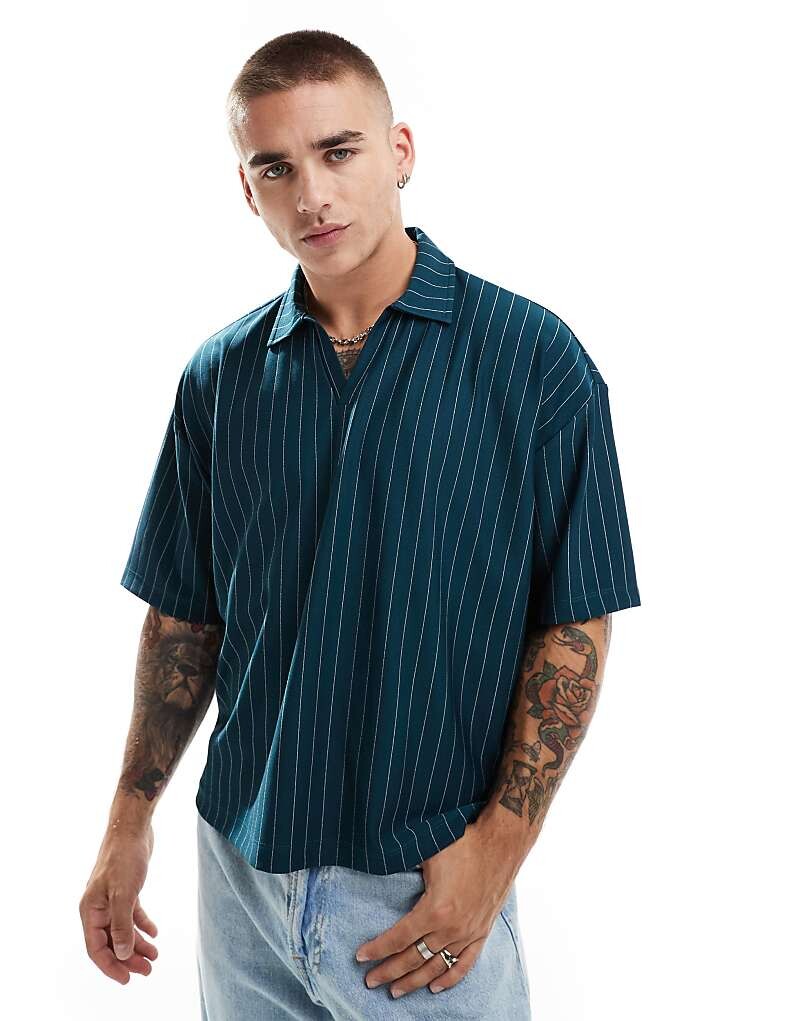 

ASOS DESIGN – зеленая рубашка-поло свободного кроя в полоску