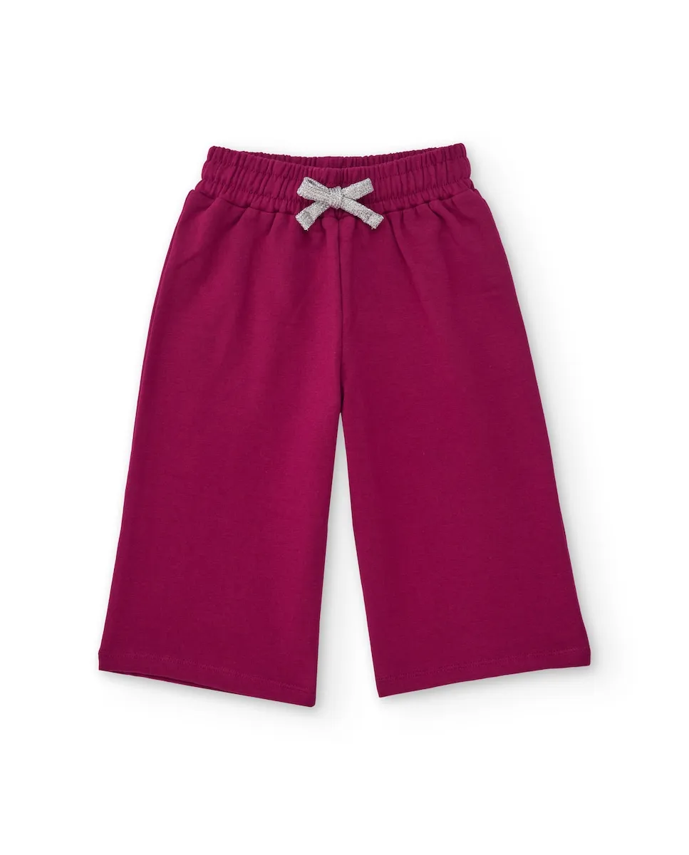 

Широкие детские брюки для девочки фуксиевого цвета с блестящим бантом Tuc tuc