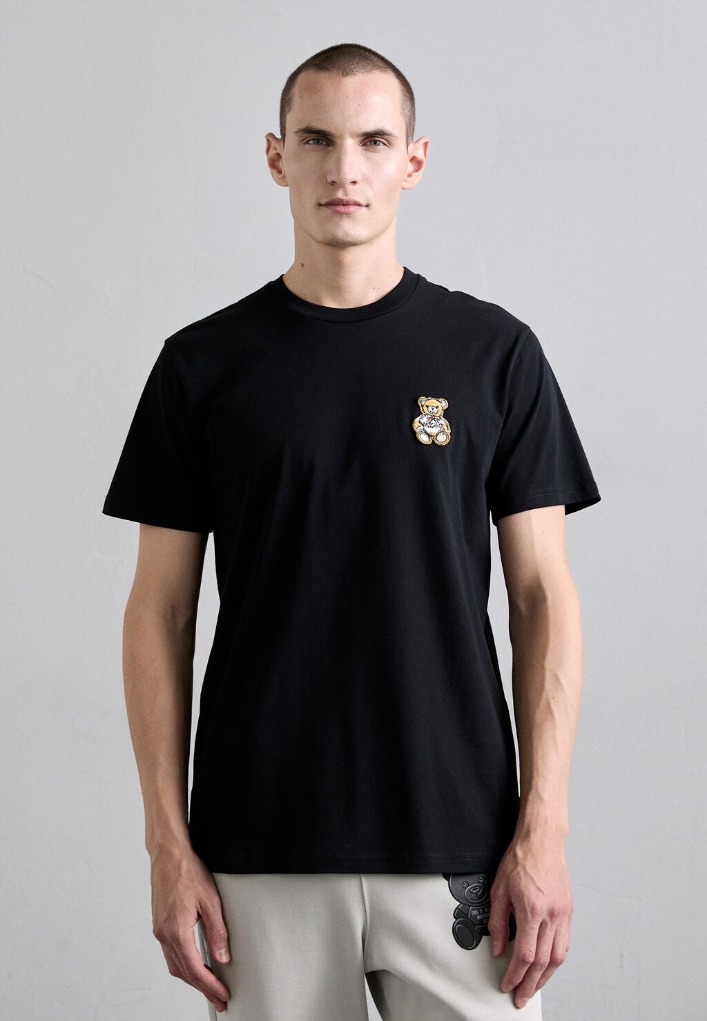 

Принт на футболке MOSCHINO, черный