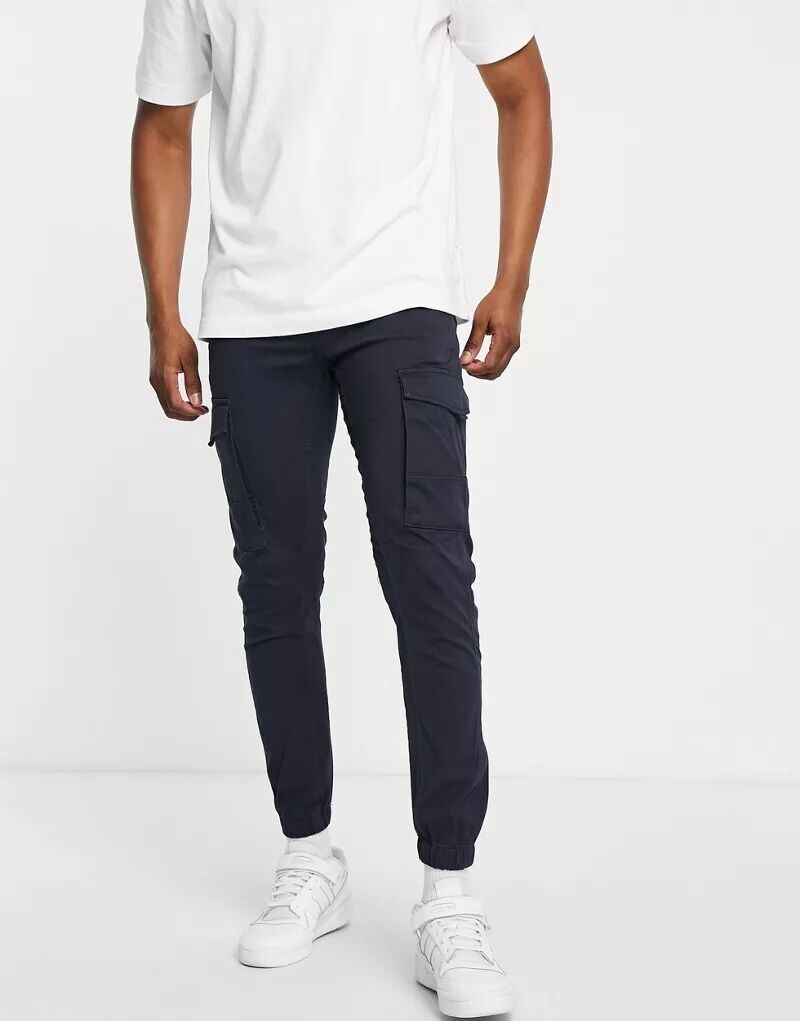 

Темно-синие узкие брюки карго с манжетами Jack & Jones Intelligence