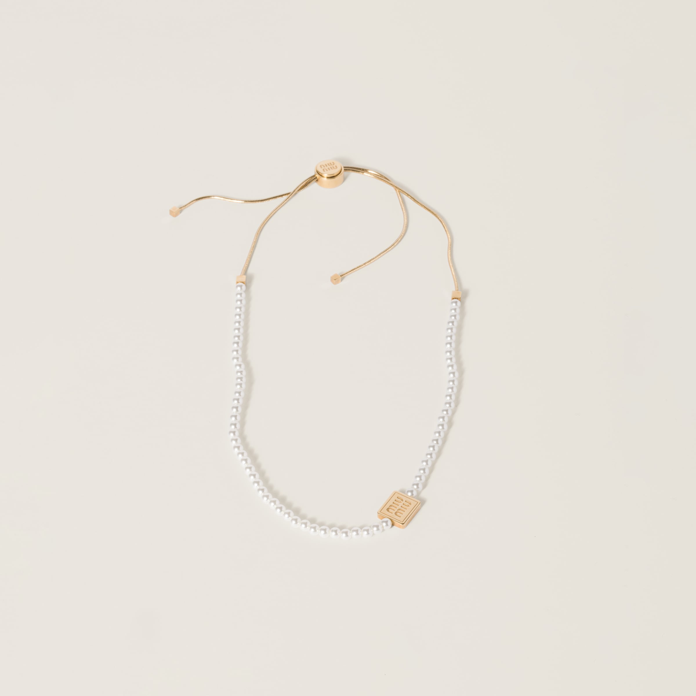 

Чокер из жемчуга и металла MIU MIU, золотой