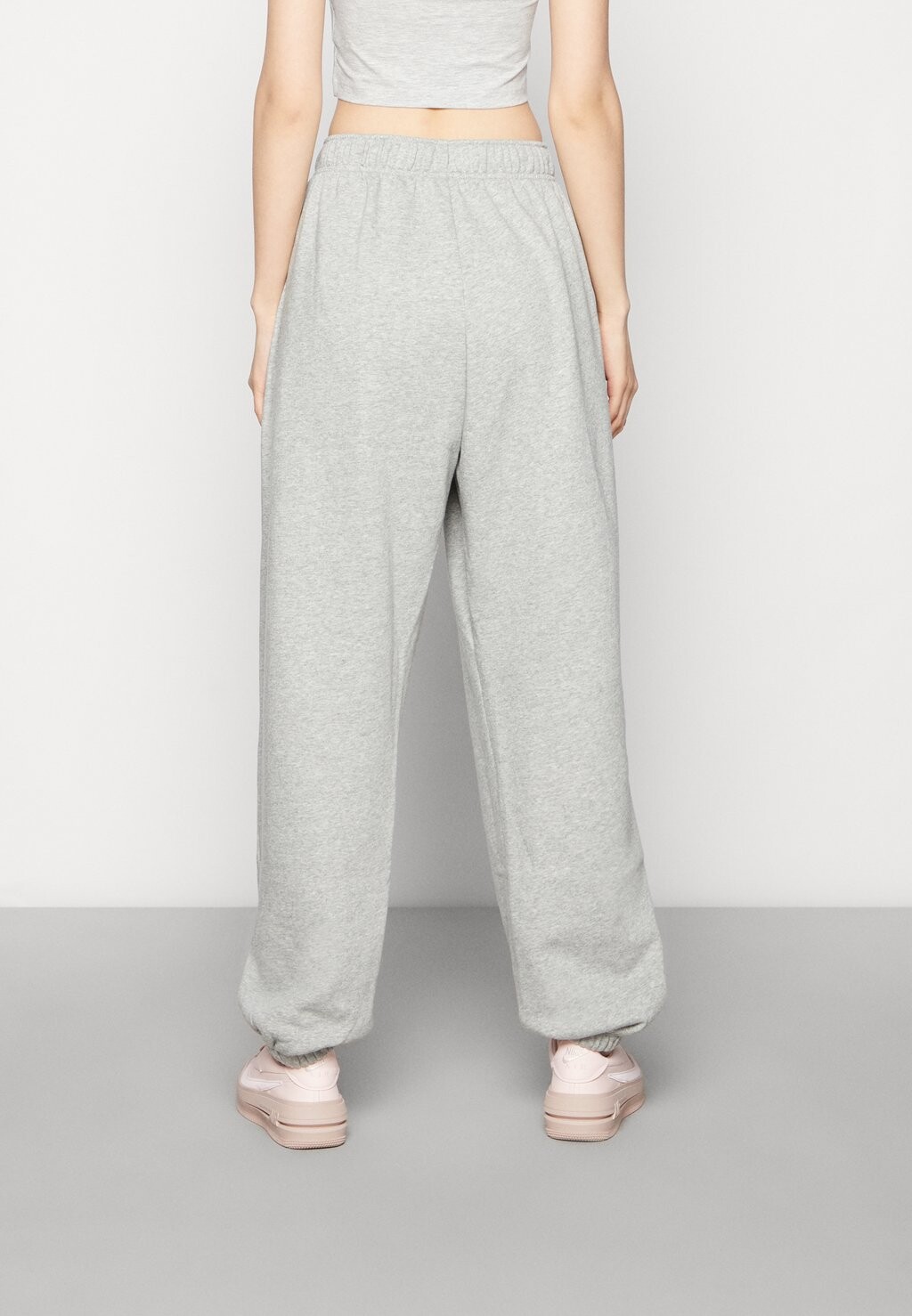 

Брюки спортивного костюма W Nsw Club Flc Mr Pant Os Nike, серый
