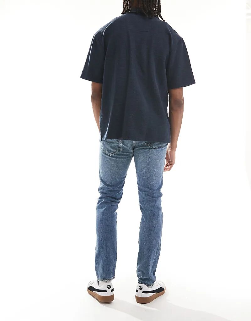 Джинсы Levi's 502 зауженного кроя светлого цвета — фото 3
