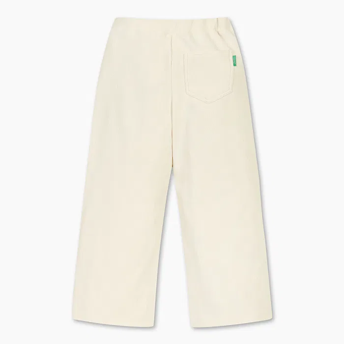 Детские джерси-брюки свободного кроя цвета айвори от Benetton Kids — фото 2