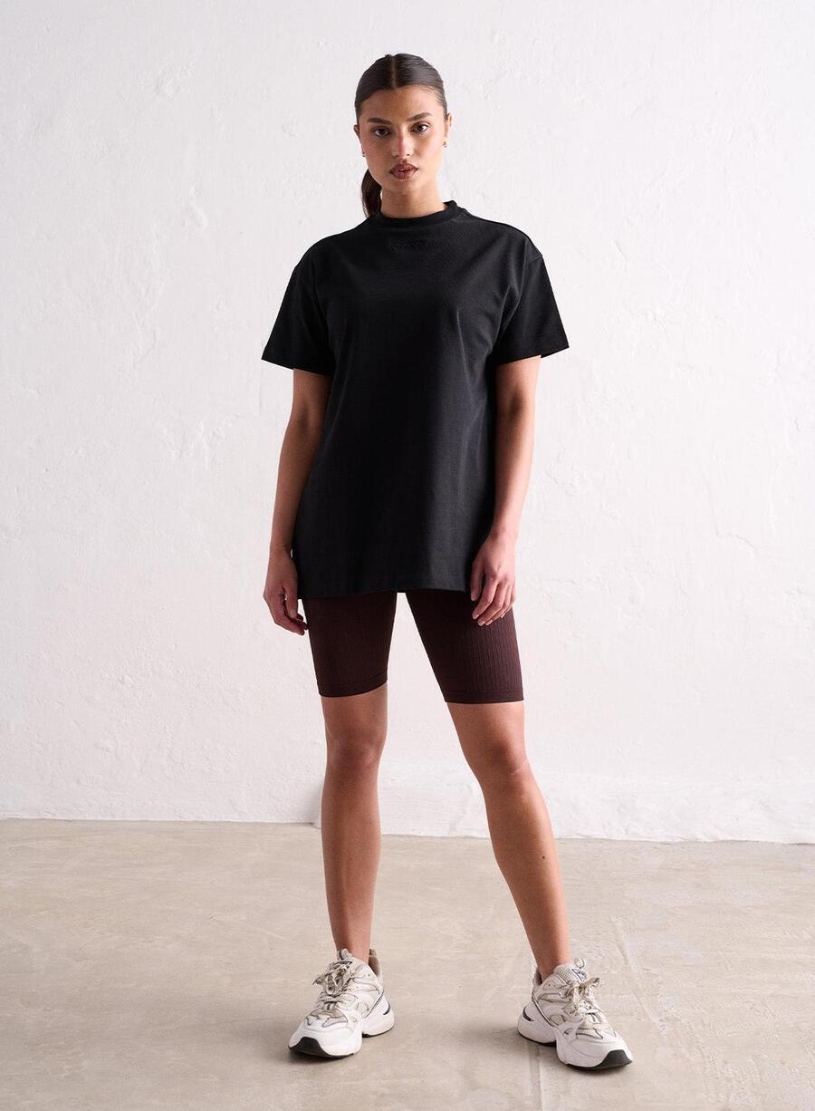 

AIM'N Женская футболка для йоги, свободного размера, черная