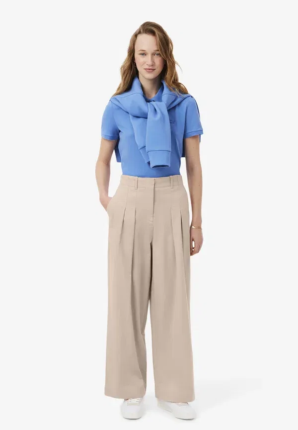 Брюки Lacoste Львиный цвет, прямые