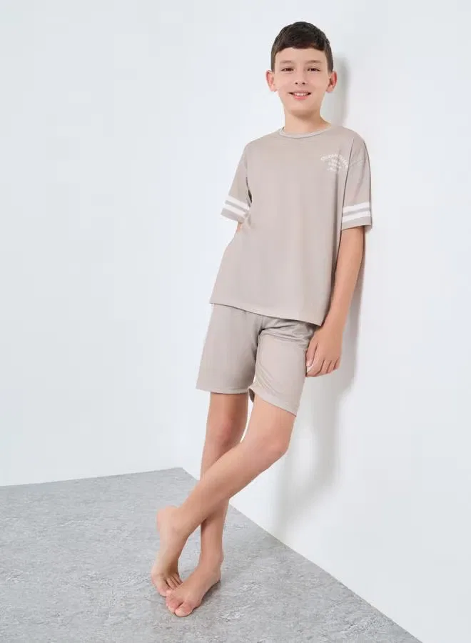 Комплект футболка и шорты с принтом Teen drop shoulder Styli, бежевый