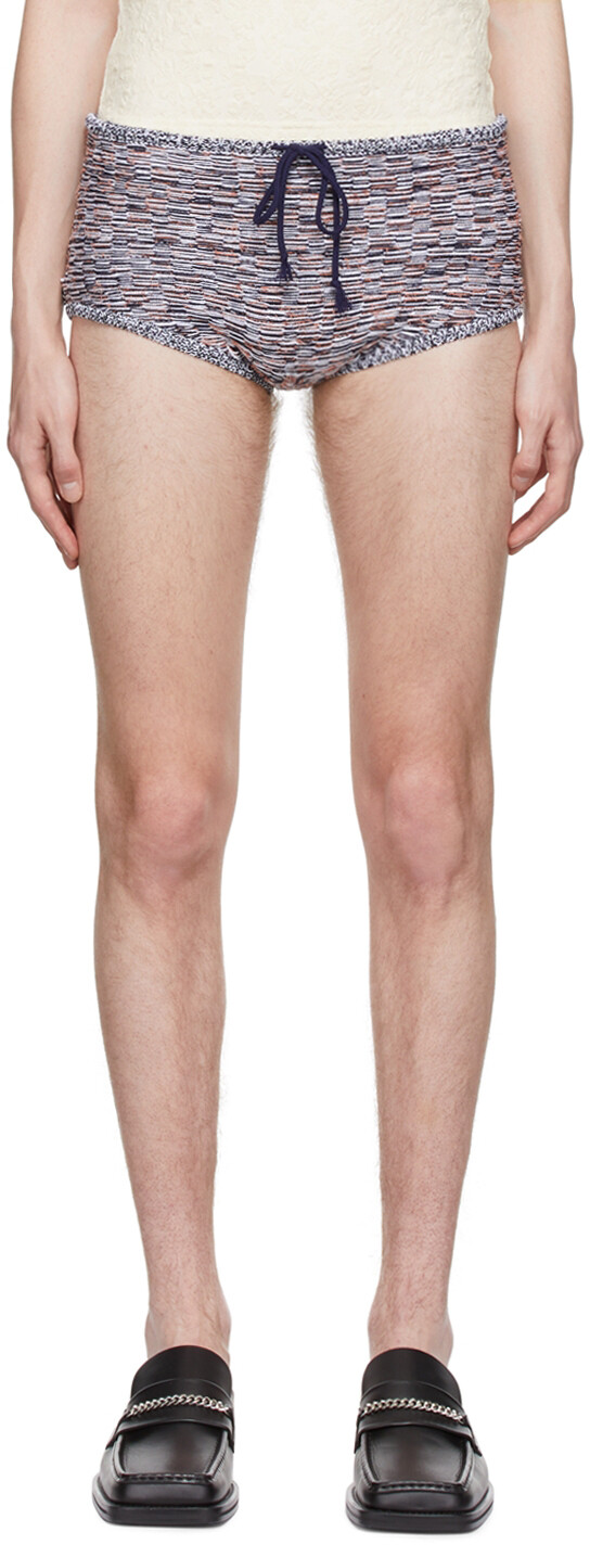 

Оранжево-черные статические шорты Eckhaus Latta