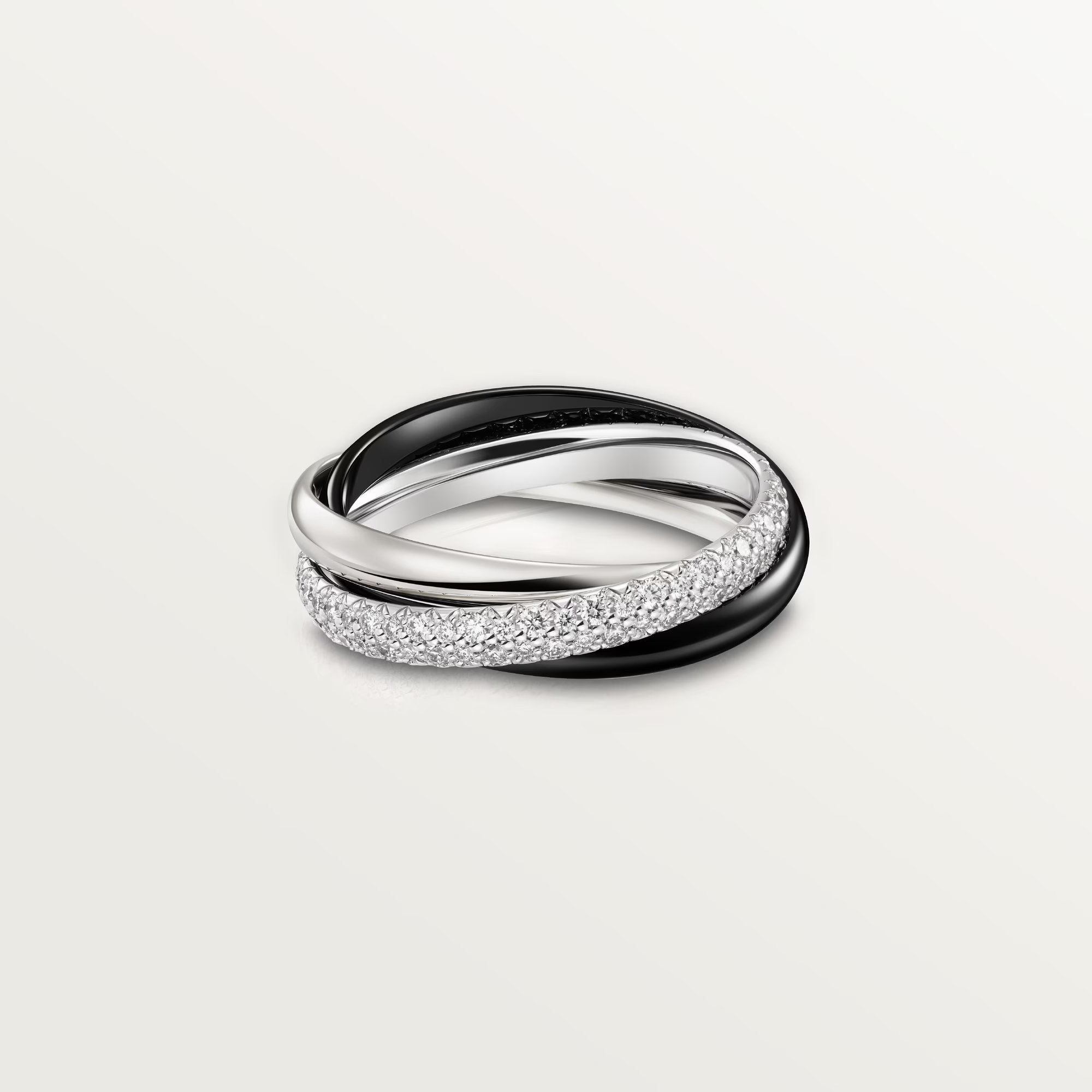 

Кольцо Cartier Trinity Small Half-paved, белое золото/черная керамика/бриллианты