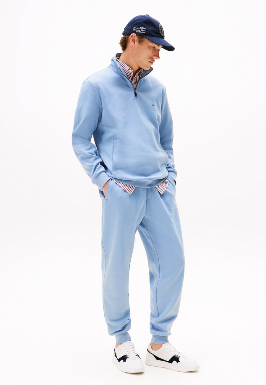 

Кроссовки Tommy Hilfiger Trainers, Ecru/Desertsky/White