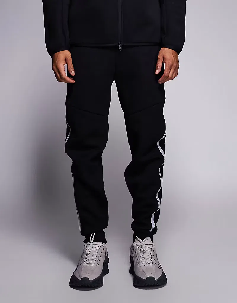 Светоотражающие спортивные штаны Nike Tech Fleece, черный