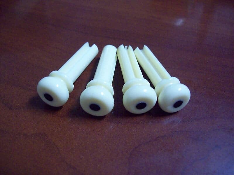 

Набор из 4 бриджевых штифтов для акустического баса - CREAM Allparts BP-0677-028