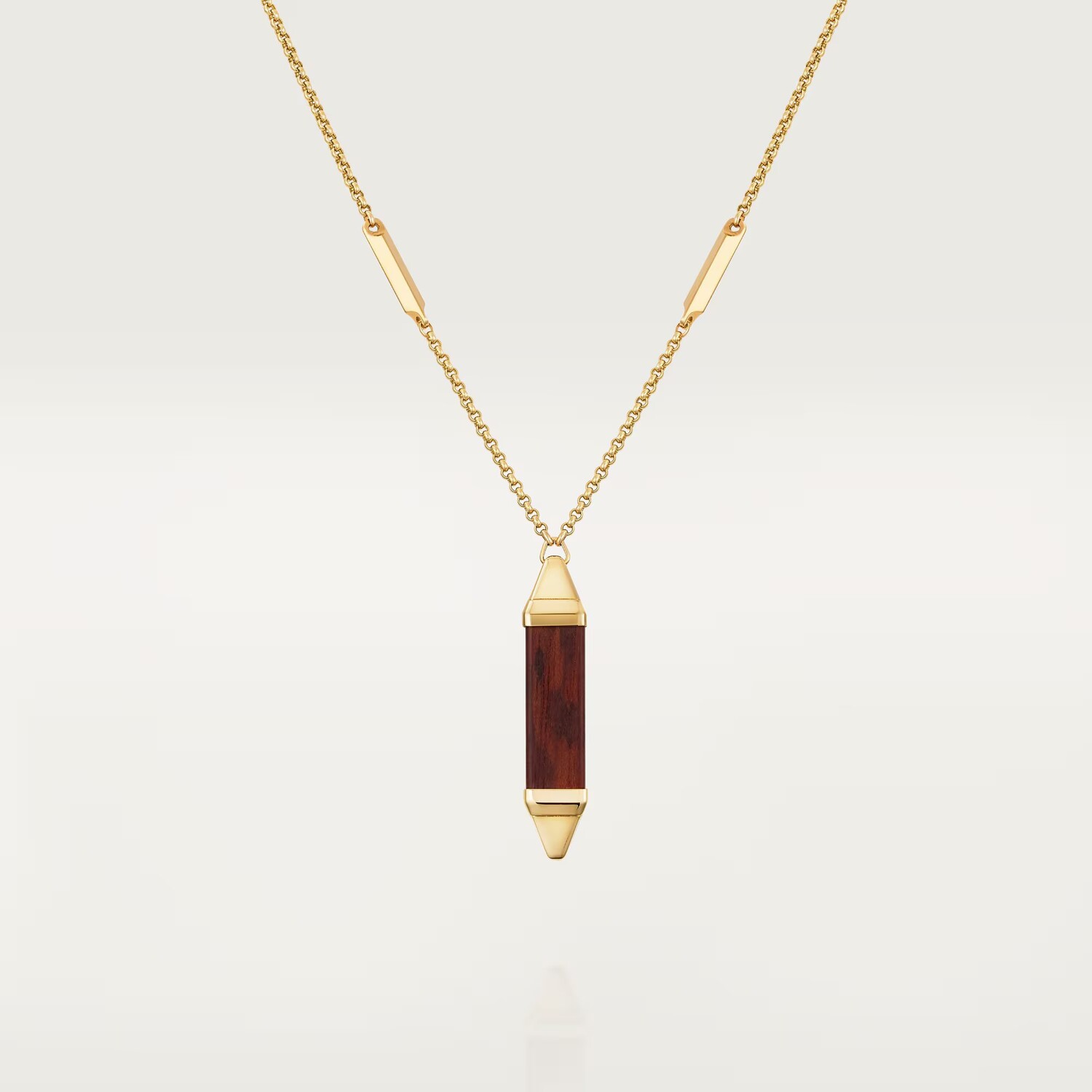 

Колье Cartier Les Berlingots de Cartier, золото/змеиное дерево