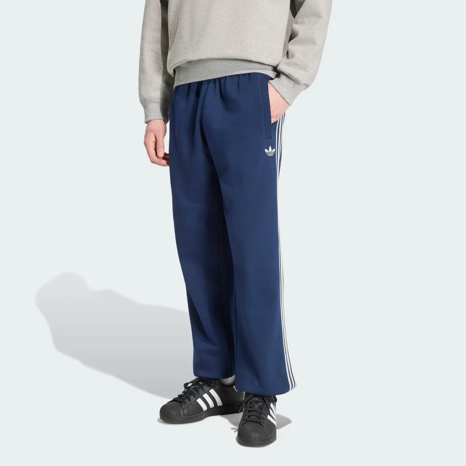 Мужские спортивные брюки на манжетах Adicolor 3-Stripes Cuffed Sweatpant Adidas Originals, темно-синий