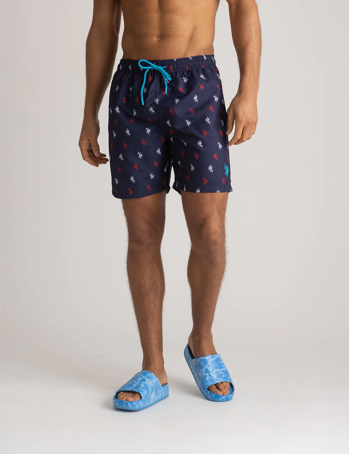 

Плавки U.S. Polo Assn 7" All Over Logo Swim Trunks, темно-синий