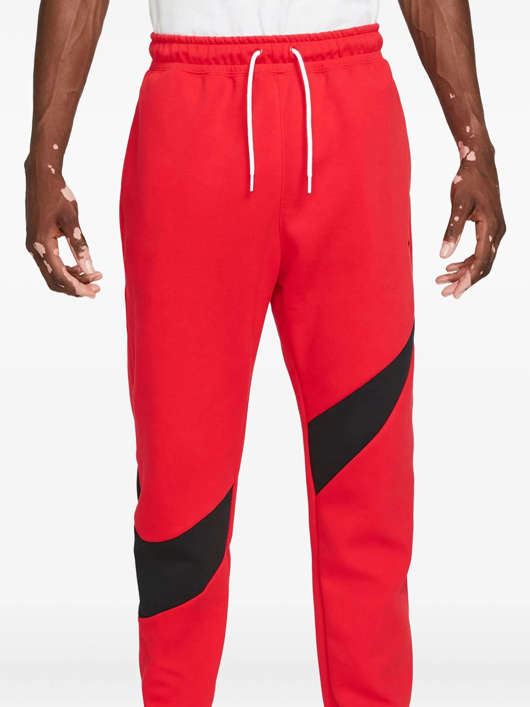 

Спортивные брюки с логотипом Swoosh Nike, красный