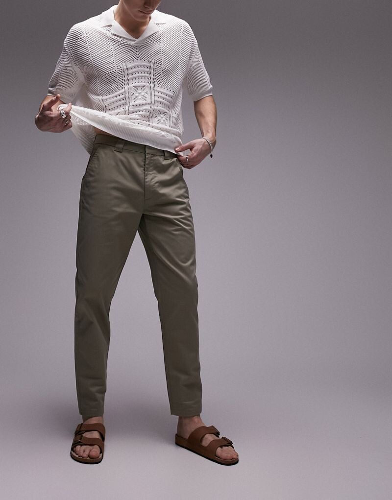 

Темно-синие брюки чинос с зауженным верхом Topman