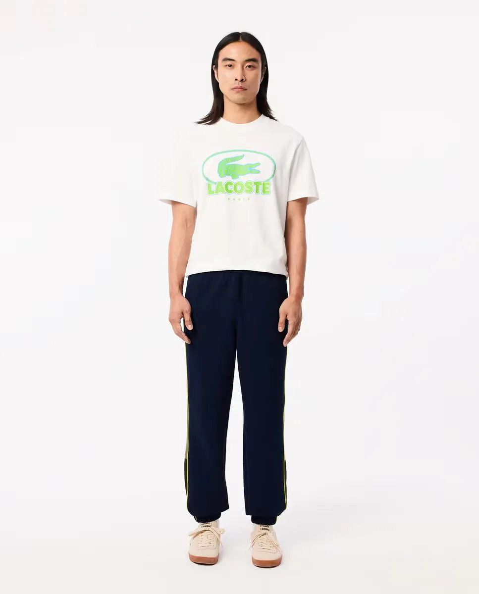 

Мужские спортивные брюки из пике синего цвета Lacoste, темно-синий