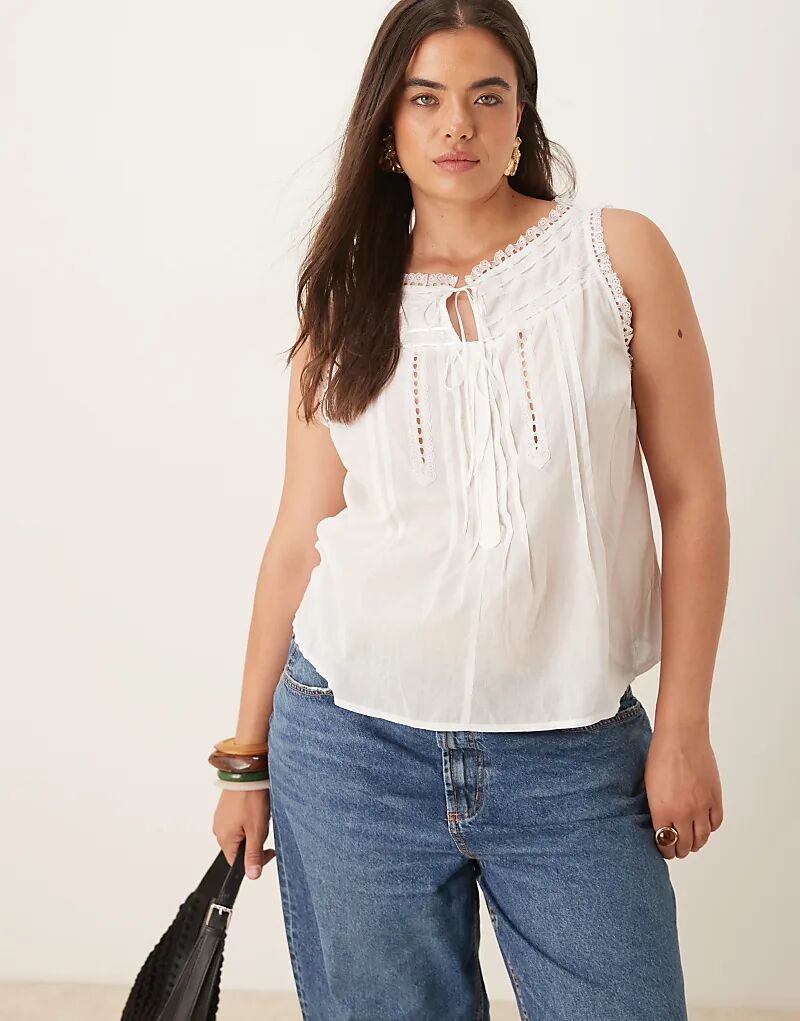 

Топ без рукавов ASOS DESIGN Curve с кружевной отделкой и завязкой из ленты белого цвета Asos Curve