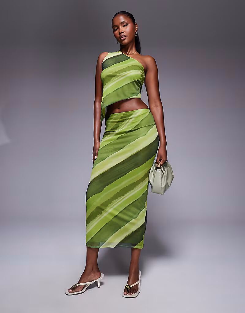 

Юбка миди из сетчатой ​​ткани с зеленым абстрактным принтом Asos Design