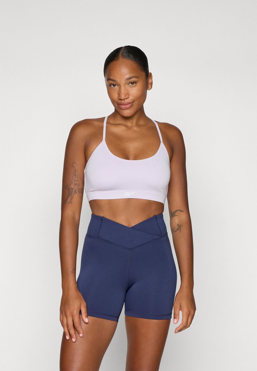 

Бюстгальтер Reebok KENDAL CORE STRAPPY BRA, Digital Gleam/Lilac