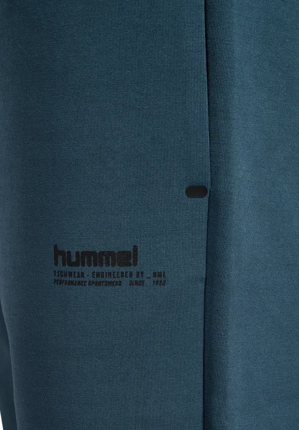 Штаны спортивные детские Hummel Dbu 26 travel tech pants kids tracksuit bottoms, цвет звездный наблюдатель — фото 4