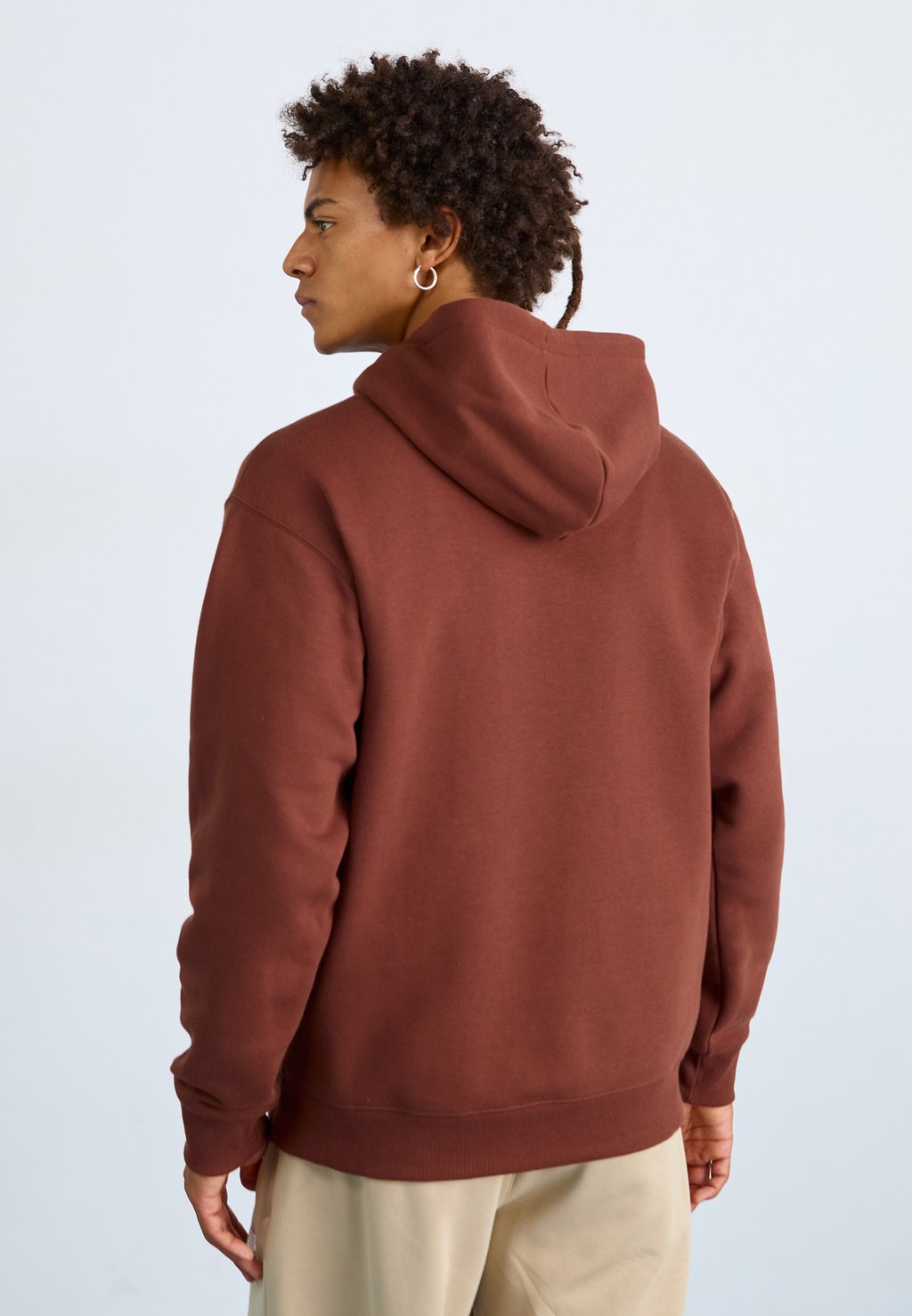 

Толстовка SPORT ESSENTIALS HOODIE UNISEX New Balance, коричневый
