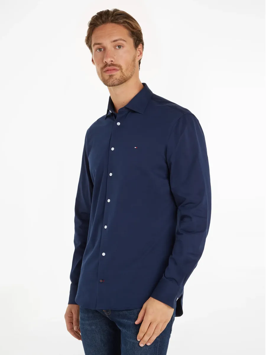 

Деловая рубашка Tommy Hilfiger "CL KNITTED SOLID RF SHIRT", с воротником "Кент", цвет Navy Iris