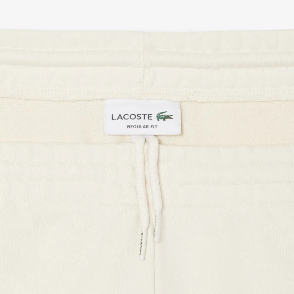 Мужские кремовые джоггеры Lacoste Regular Fit с графикой — фото 3