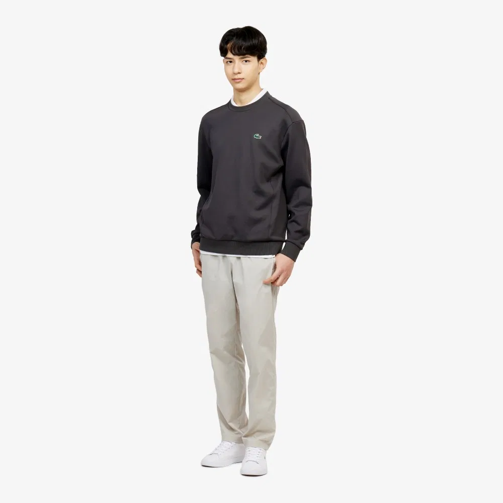 Мужские тканые брюки бежевые от Lacoste