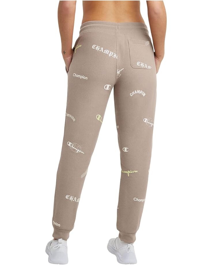 

Брюки Champion Reverse Weave Joggers All Over Print, цвет Multi Logo Mix Dark Khaki