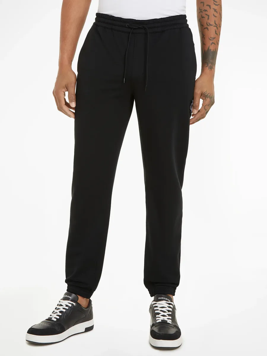 

Спортивные брюки Calvin Klein Jeans "SKINNY TECHNICAL BADGE PANT" с нашивкой-логотипом, цвет Ck Black