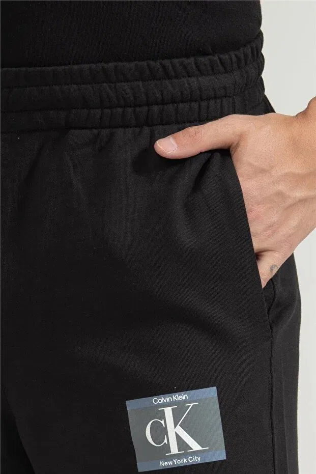 Мужские спортивные брюки зауженные Calvin Klein, Black — фото 4