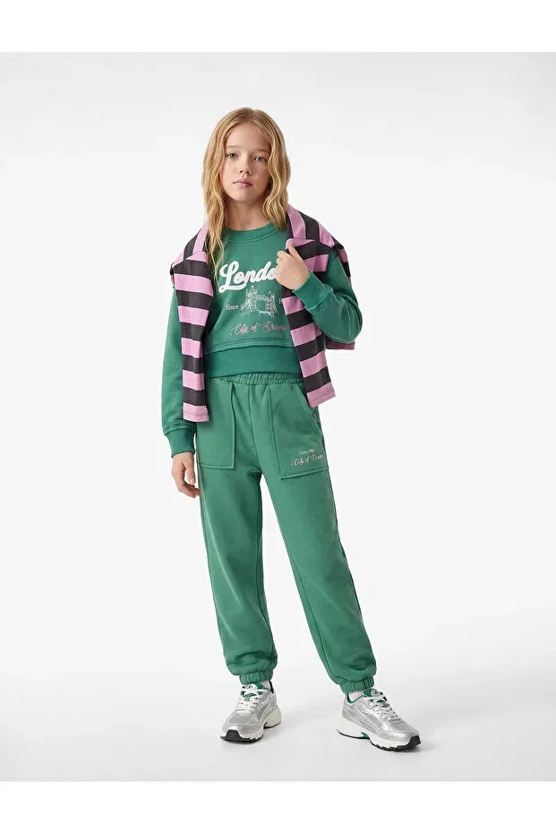 Детские спортивные штаны для девочек с принтом Jogger sweatpants with raised print and pocket detail Koton, Green
