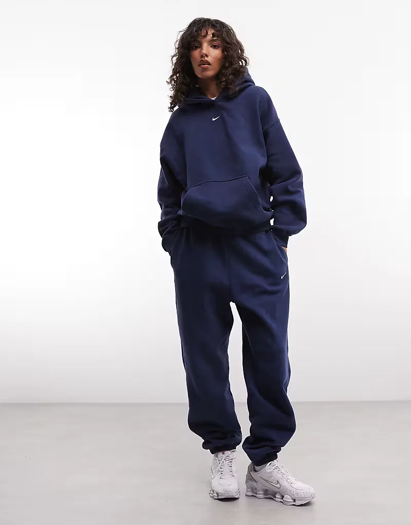 Спортивные брюки Nike Studio Fleece средней плотности, свободного кроя, с манжетами, темно-синий
