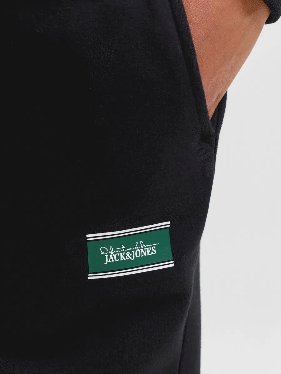 Детский спортивный костюм Jack & Jones Junior 'JJBUSTER' черного цвета — фото 2