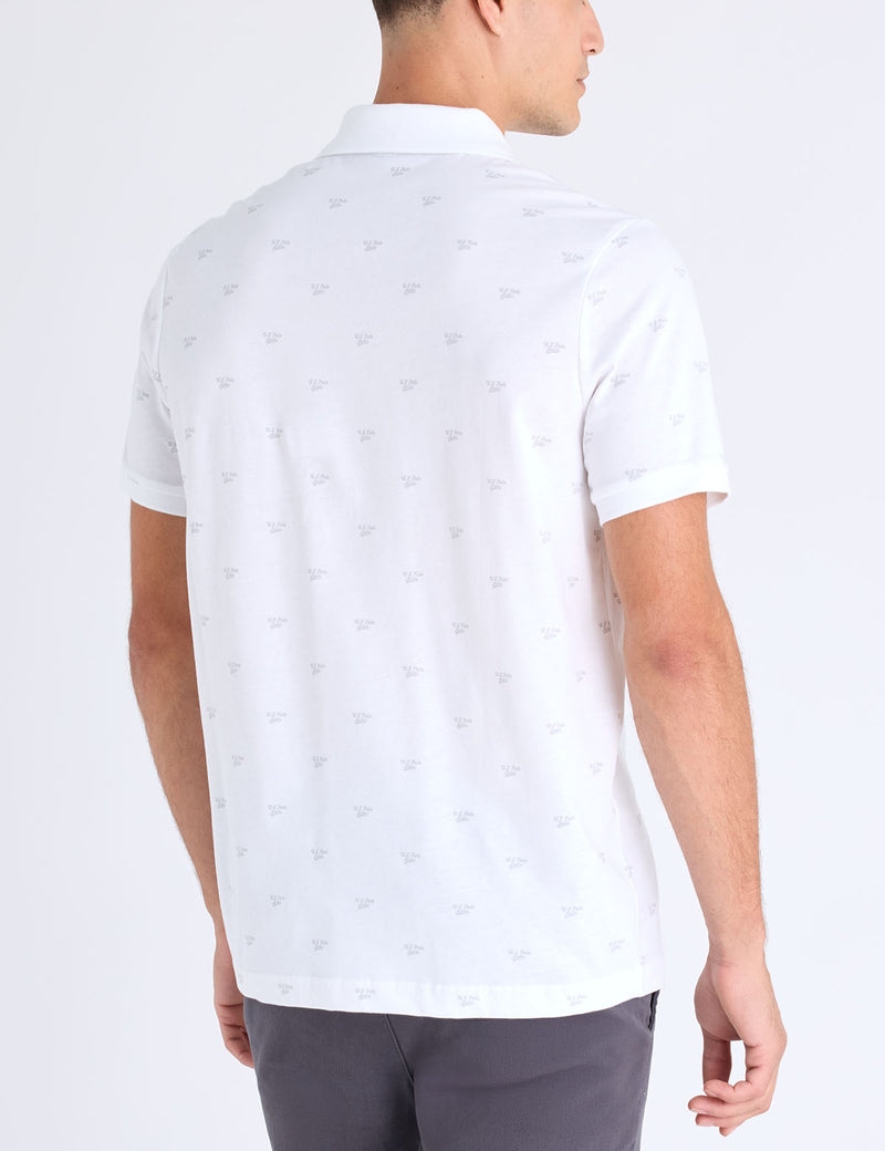 Мужская футболка-поло U.S. Polo Assn. All Over Wordmark Graphic Print Jersey, белый — фото 2