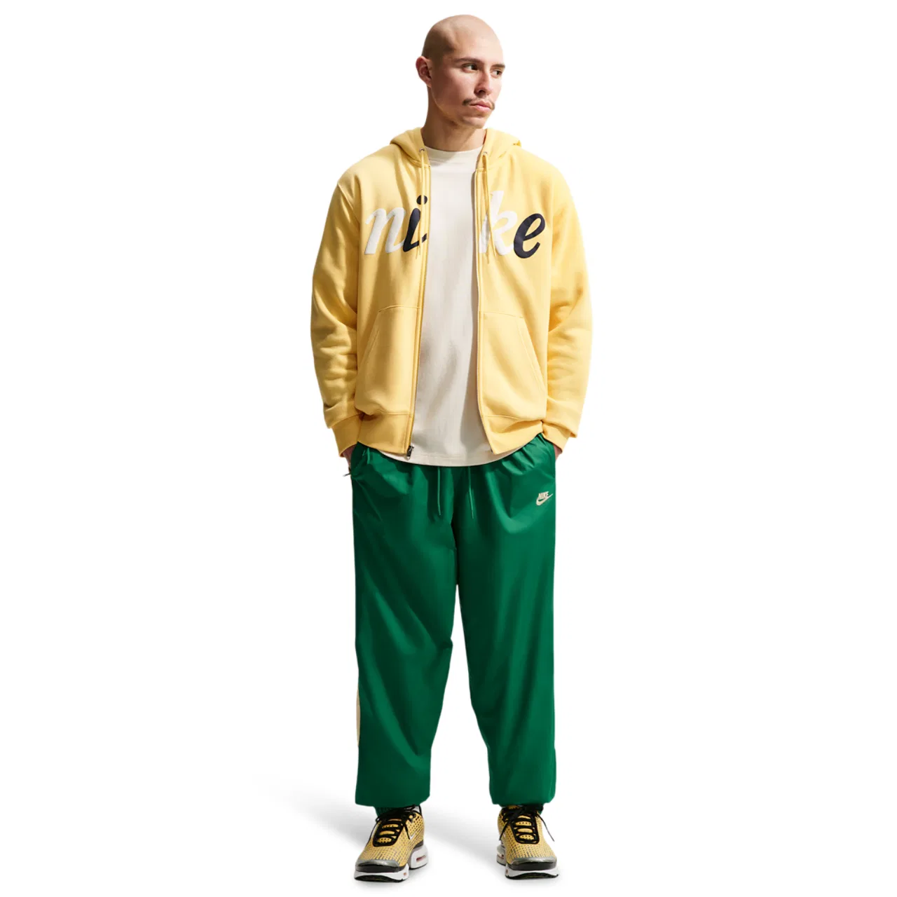 Мужские брюки Windrunner Nike, цвет Topaz Gold/Malachite/Topaz Gold — фото 3